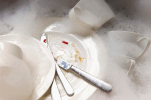 Cutlery In Washing Tub