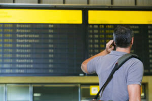 Man Is Checking The Flight Status